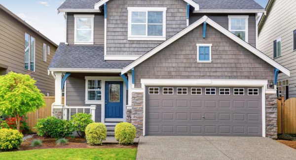 Modern house with gray exterior and white trim.